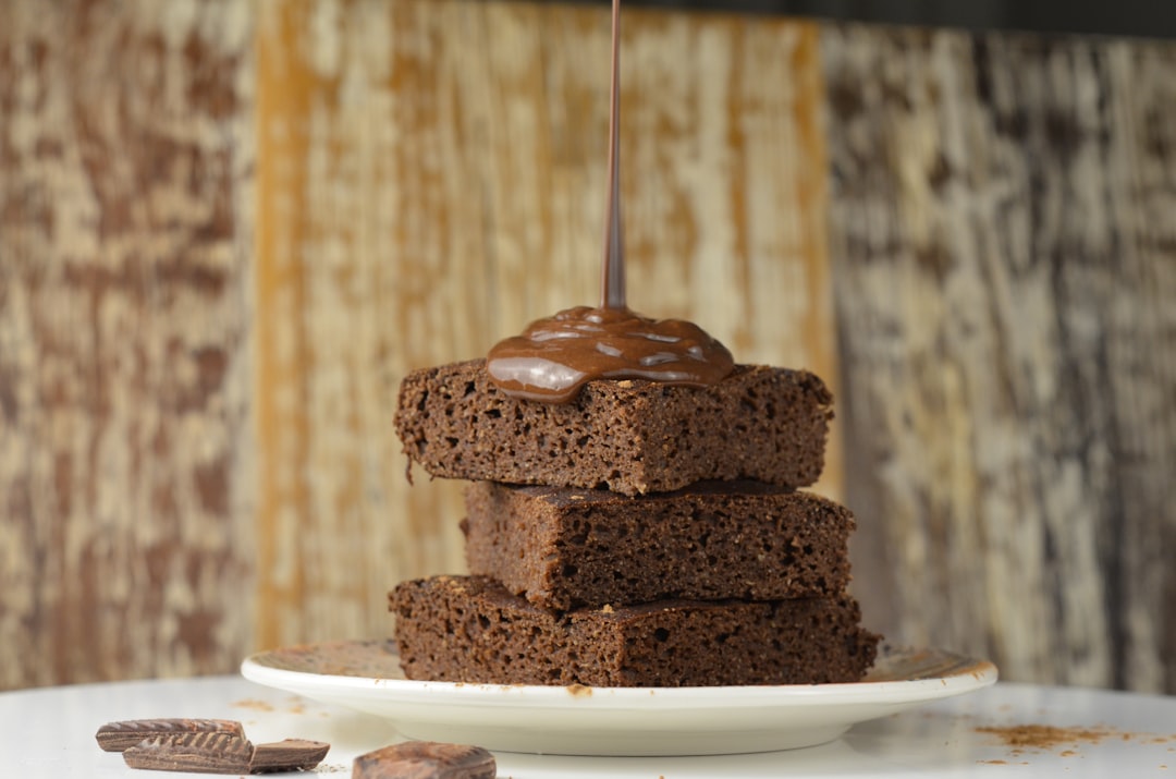 Cocoa Brownies with Chocolate Ganache & Pecans. Photo by eduardo froza on Unsplash