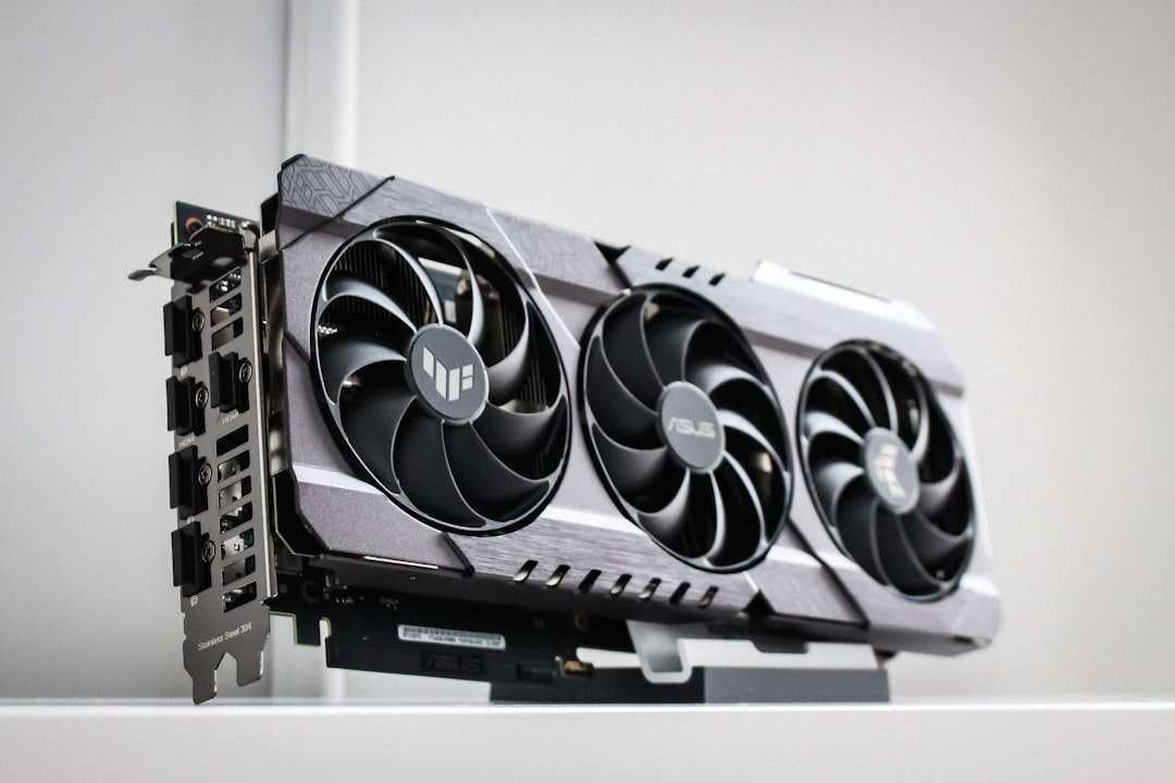 Close-up of a graphics card and cooling fans inside a desktop computer