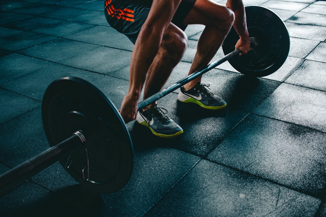 Dumbbells resting on a gym floor