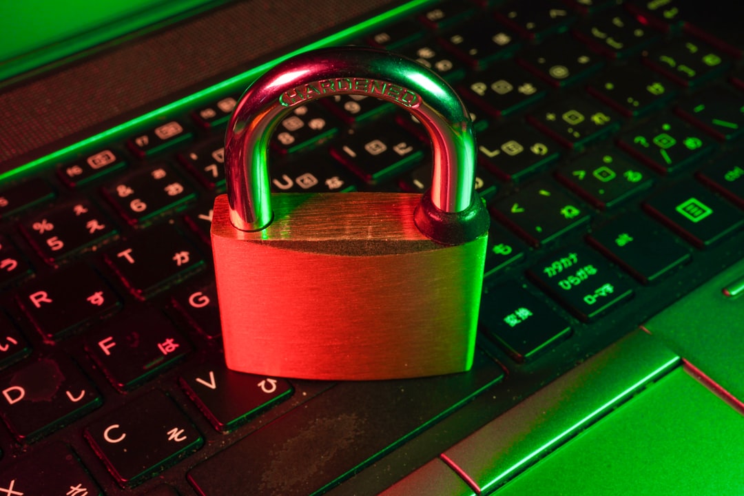 A closed padlock resting on a circuit board